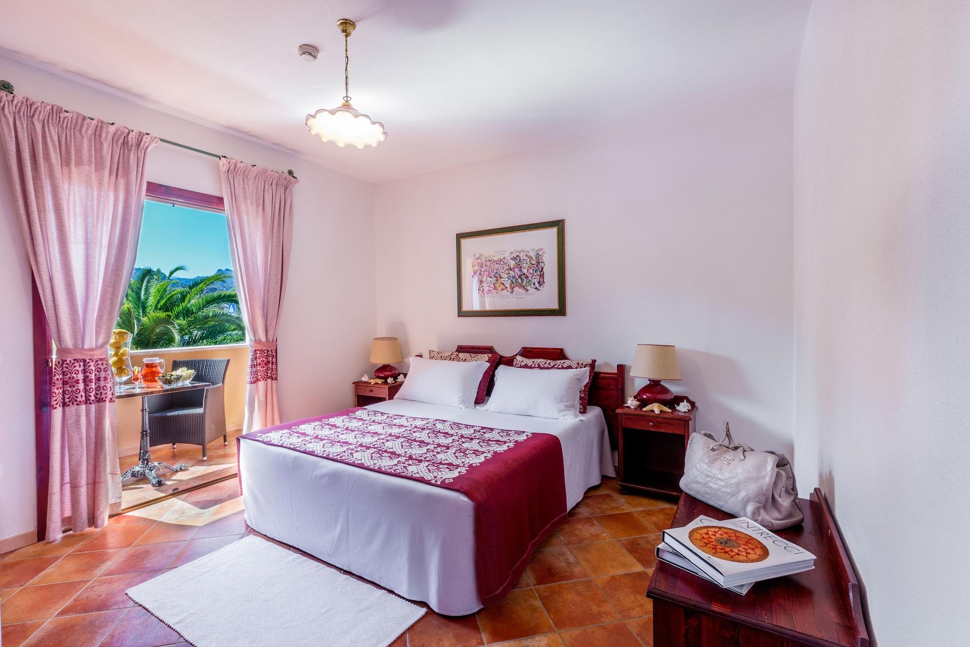 Residence Sos Alinos Cala Liberotto Esterno foto